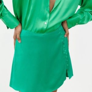 Green satin skort with buttons